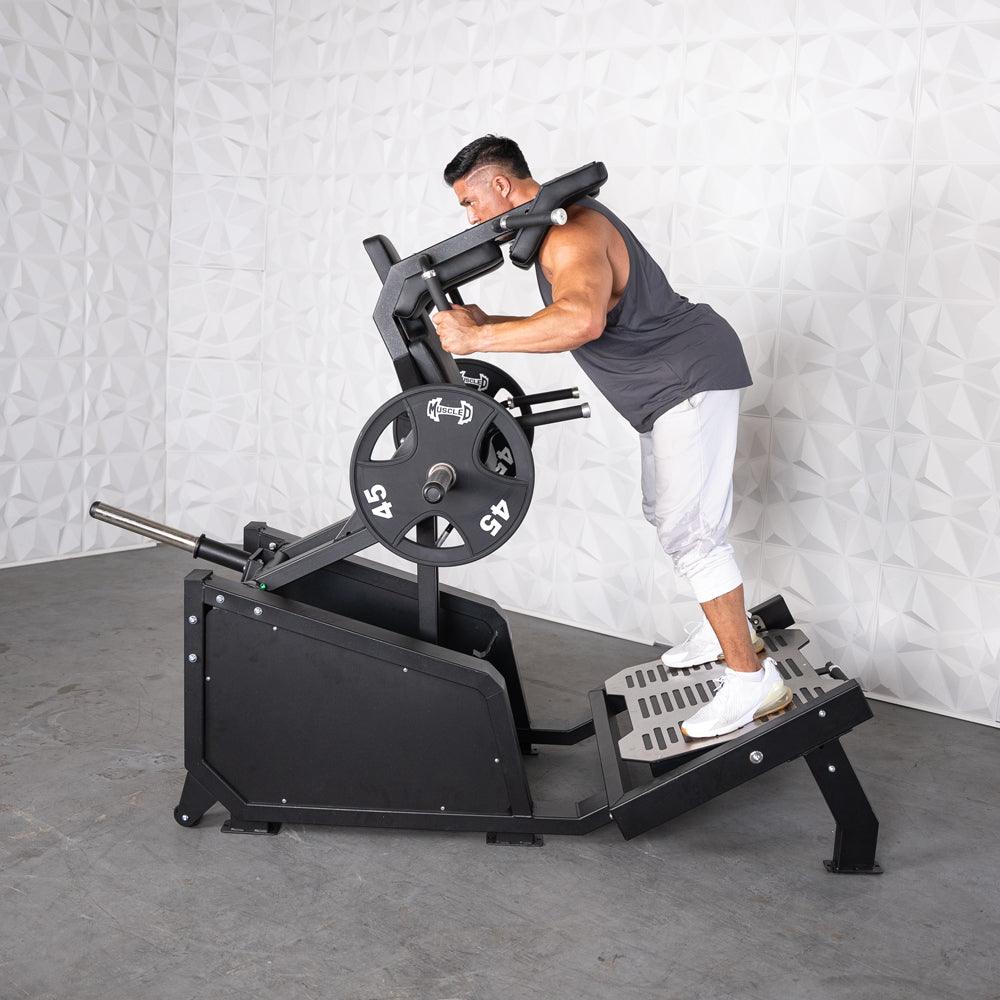 Excel Glute Line Hack Squat / Front Squat - Muscle D Fitness - Plate Load Squat Machine - Counter Balanced - Plate Storage Pegs - Grit Grind Strength