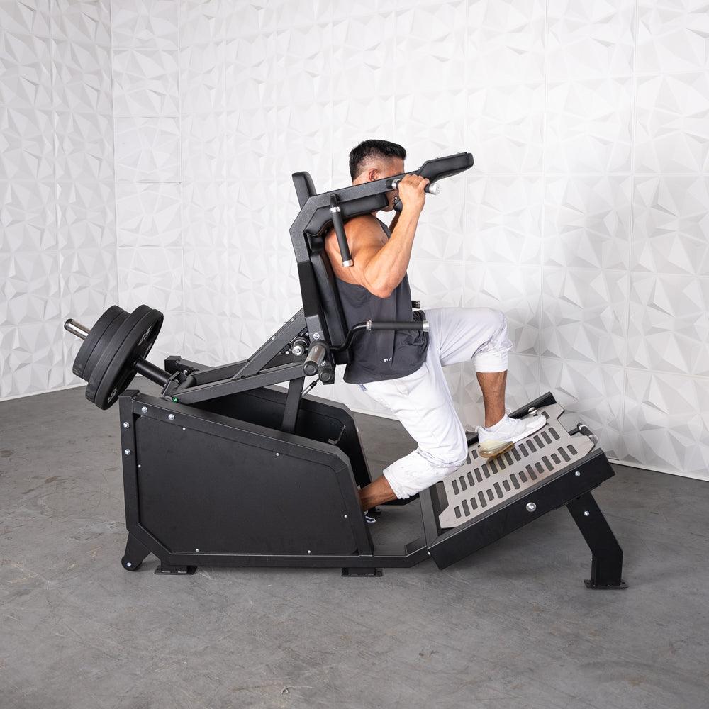 Excel Glute Line Hack Squat / Front Squat - Muscle D Fitness - Plate Load Squat Machine - Counter Balanced - Plate Storage Pegs - Grit Grind Strength