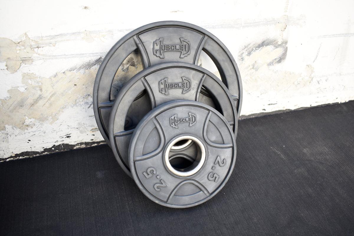 Pro Rubber Olympic Plates - Per Pair - Muscle D Fitness - High - Quality Virgin Rubber Olympic Plates - Grit Grind Strength