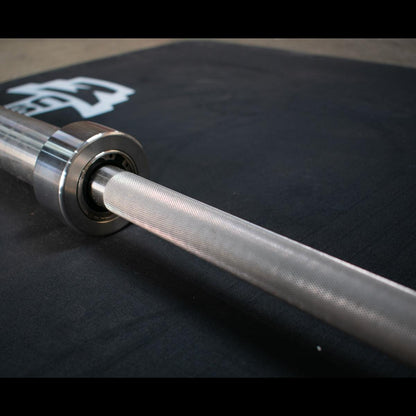 7' Stainless Steel Olympic Bar - Bushing - Muscle D Fitness - Quality Knurling - Grit Grind Strength
