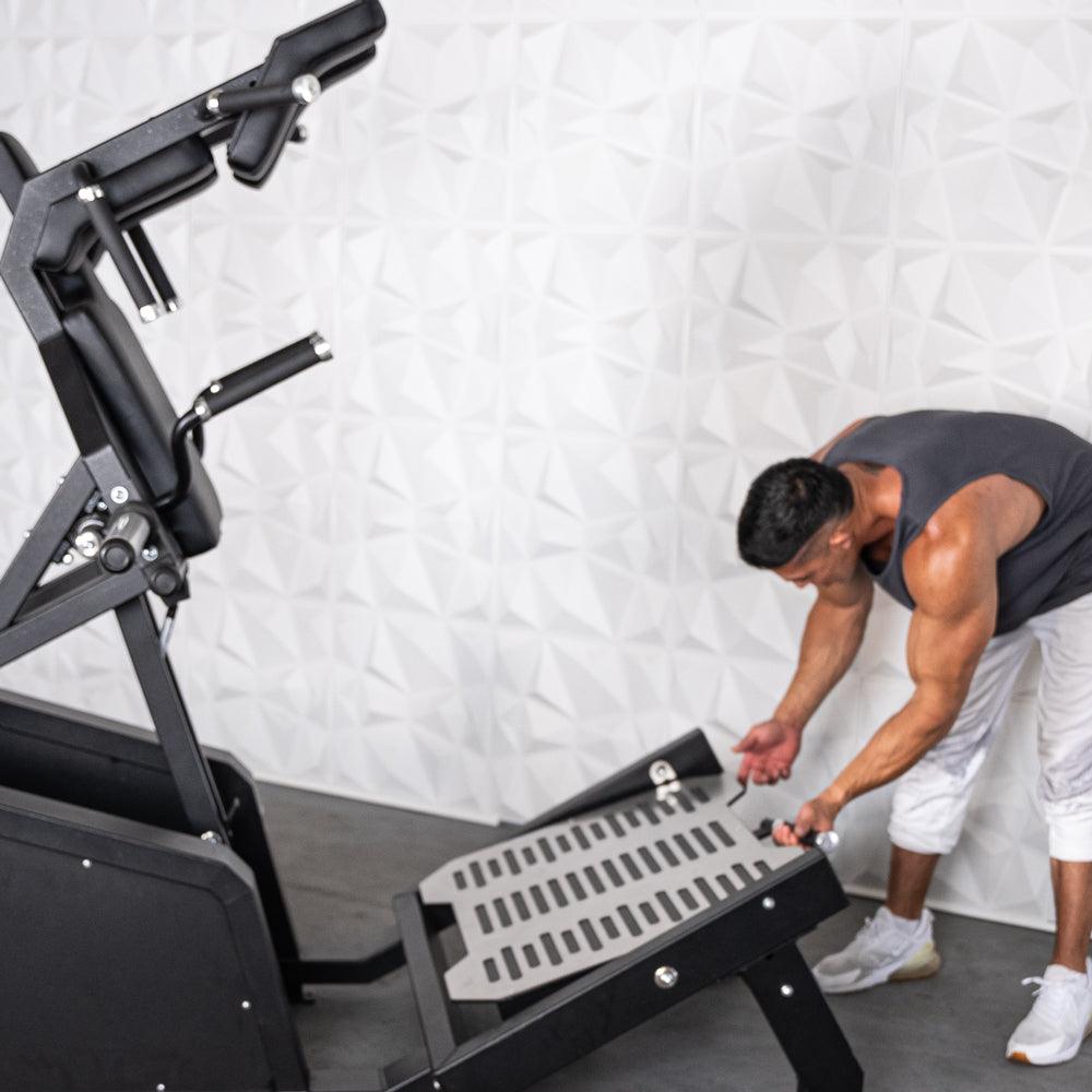 Excel Glute Line Hack Squat / Front Squat - Muscle D Fitness - Plate Load Squat Machine - Counter Balanced - Plate Storage Pegs - Grit Grind Strength