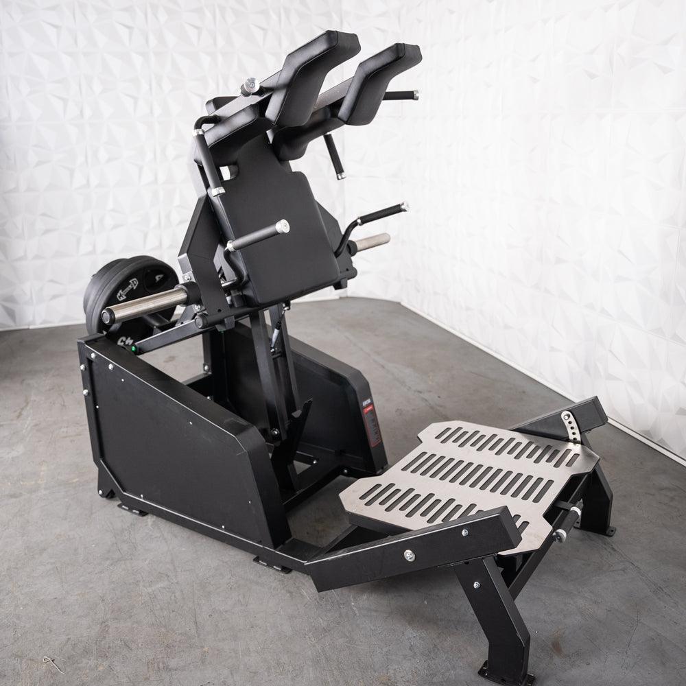 Excel Glute Line Hack Squat / Front Squat - Muscle D Fitness - Plate Load Squat Machine - Counter Balanced - Plate Storage Pegs - Grit Grind Strength