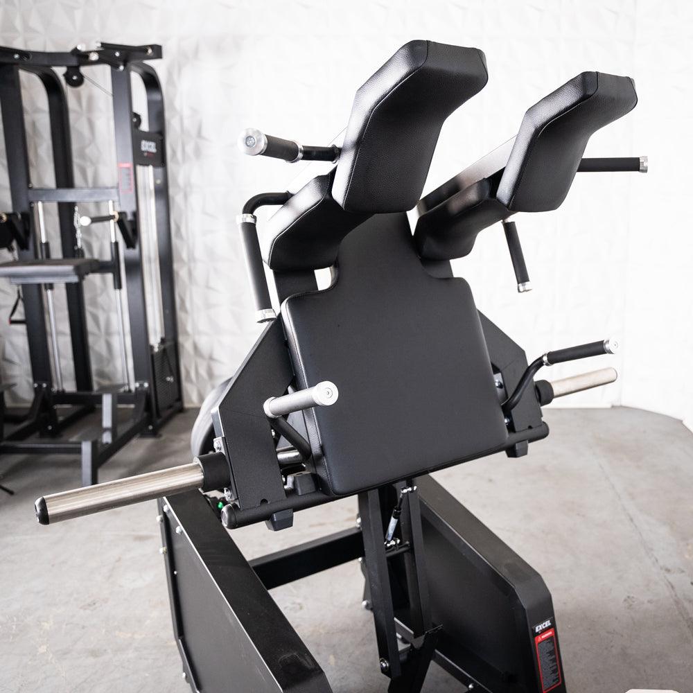 Excel Glute Line Hack Squat / Front Squat - Muscle D Fitness - Plate Load Squat Machine - Counter Balanced - Plate Storage Pegs - Grit Grind Strength