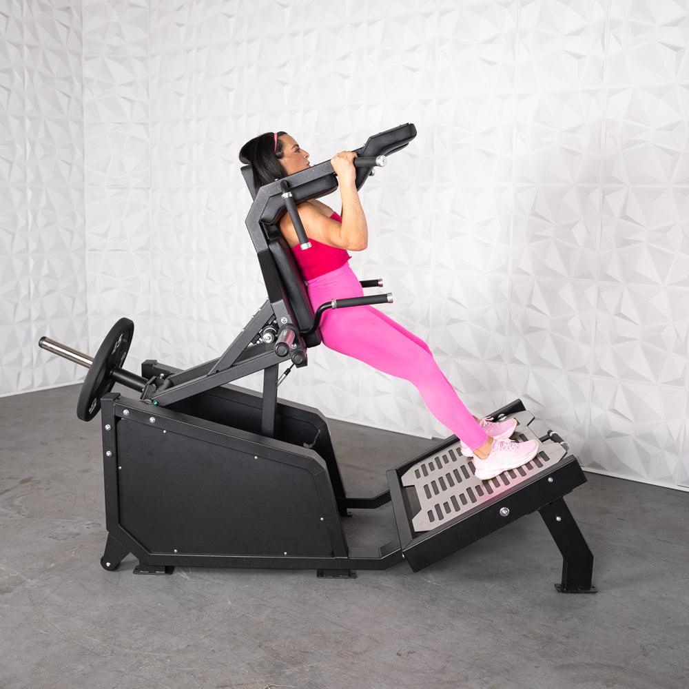 Excel Glute Line Hack Squat / Front Squat - Muscle D Fitness - Plate Load Squat Machine - Counter Balanced - Plate Storage Pegs - Grit Grind Strength