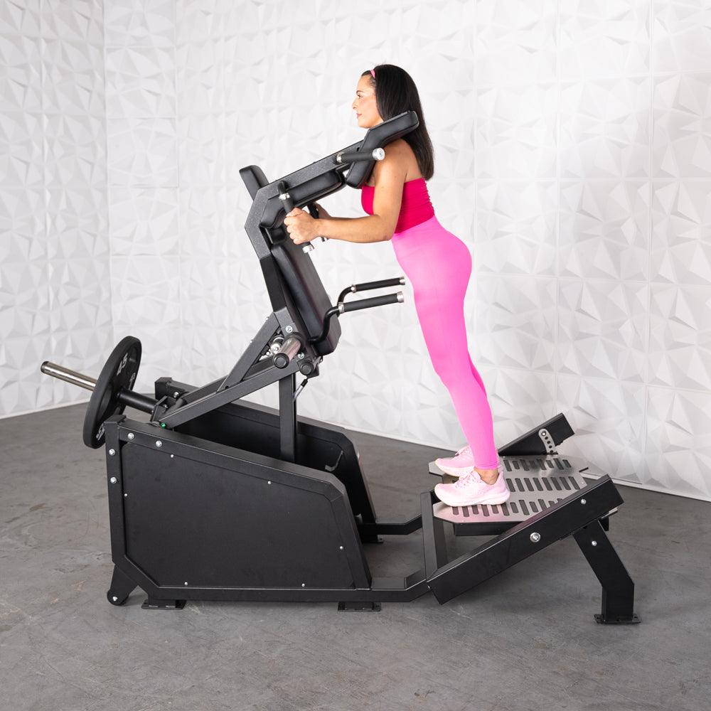 Excel Glute Line Hack Squat / Front Squat - Muscle D Fitness - Plate Load Squat Machine - Counter Balanced - Plate Storage Pegs - Grit Grind Strength