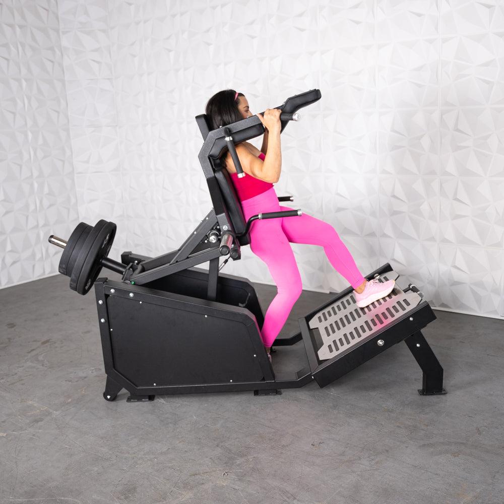 Excel Glute Line Hack Squat / Front Squat - Muscle D Fitness - Plate Load Squat Machine - Counter Balanced - Plate Storage Pegs - Grit Grind Strength