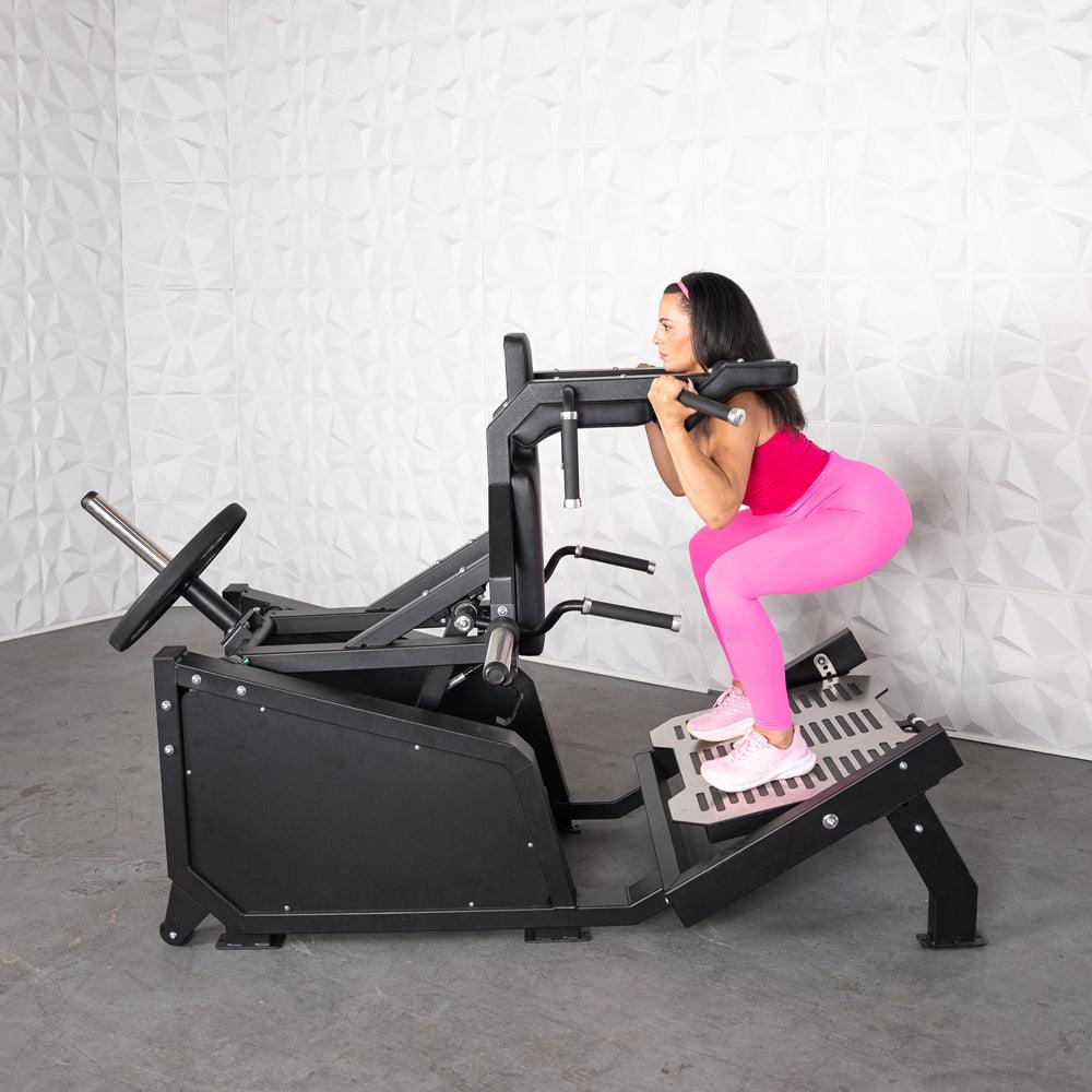 Excel Glute Line Hack Squat / Front Squat - Muscle D Fitness - Plate Load Squat Machine - Counter Balanced - Plate Storage Pegs - Grit Grind Strength