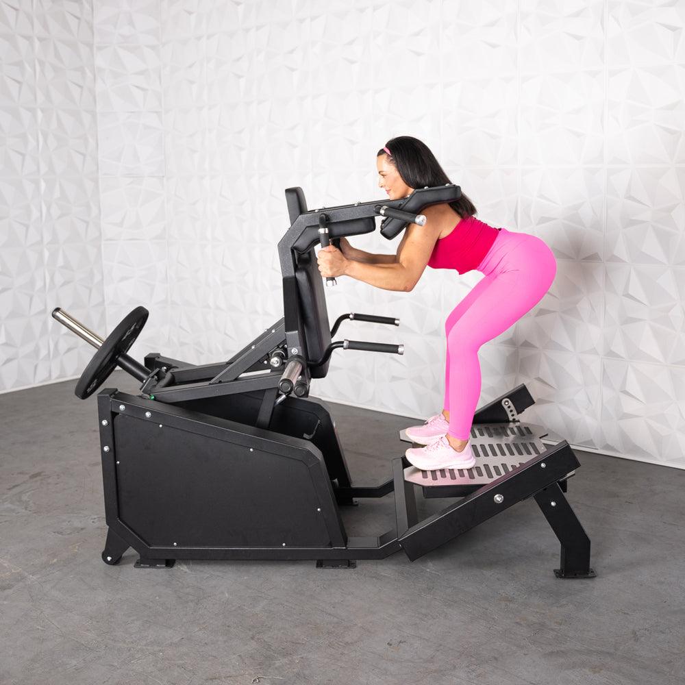 Excel Glute Line Hack Squat / Front Squat - Muscle D Fitness - Plate Load Squat Machine - Counter Balanced - Plate Storage Pegs - Grit Grind Strength