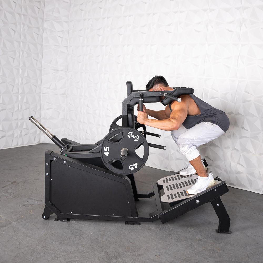 Excel Glute Line Hack Squat / Front Squat - Muscle D Fitness - Plate Load Squat Machine - Counter Balanced - Plate Storage Pegs - Grit Grind Strength