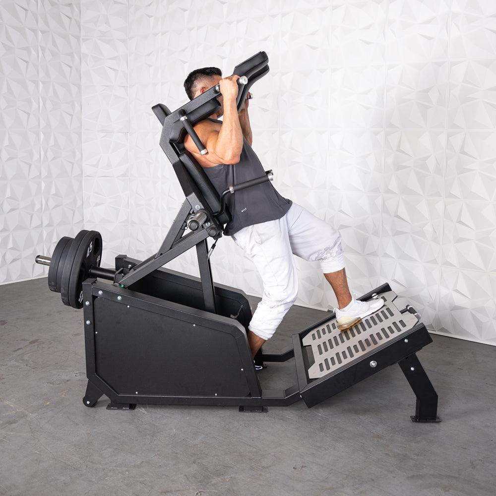 Excel Glute Line Hack Squat / Front Squat - Muscle D Fitness - Plate Load Squat Machine - Counter Balanced - Plate Storage Pegs - Grit Grind Strength