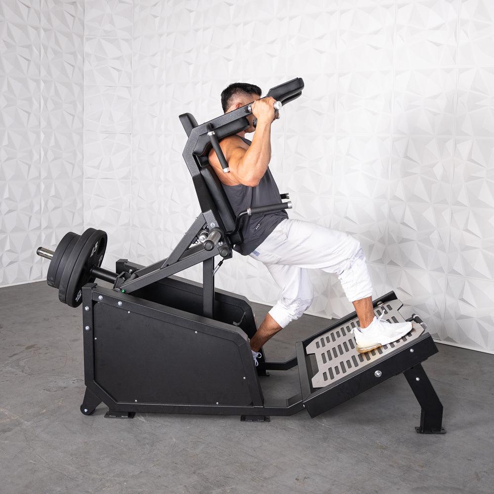 Excel Glute Line Hack Squat / Front Squat - Muscle D Fitness - Plate Load Squat Machine - Counter Balanced - Plate Storage Pegs - Grit Grind Strength