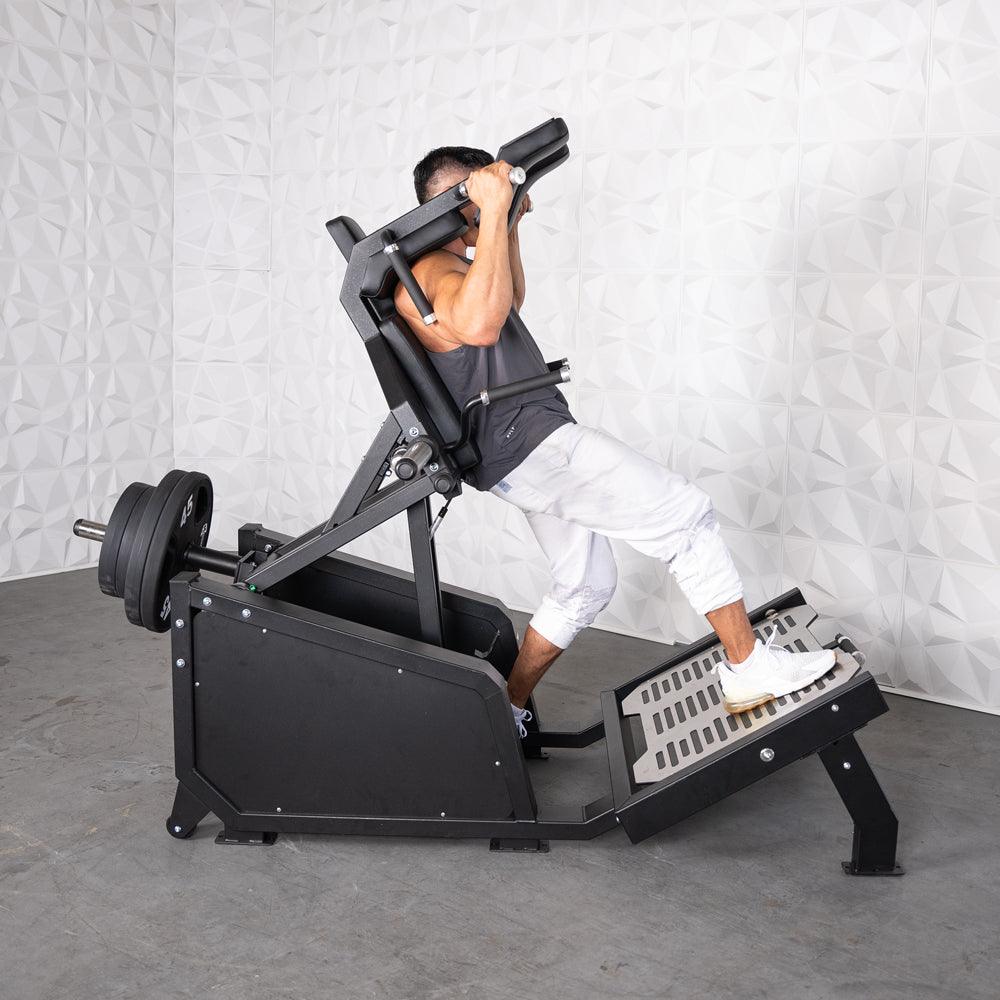 Excel Glute Line Hack Squat / Front Squat - Muscle D Fitness - Plate Load Squat Machine - Counter Balanced - Plate Storage Pegs - Grit Grind Strength