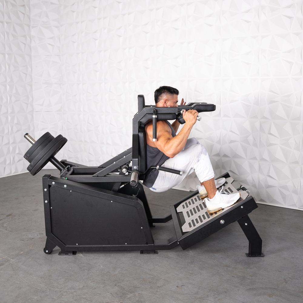 Excel Glute Line Hack Squat / Front Squat - Muscle D Fitness - Plate Load Squat Machine - Counter Balanced - Plate Storage Pegs - Grit Grind Strength