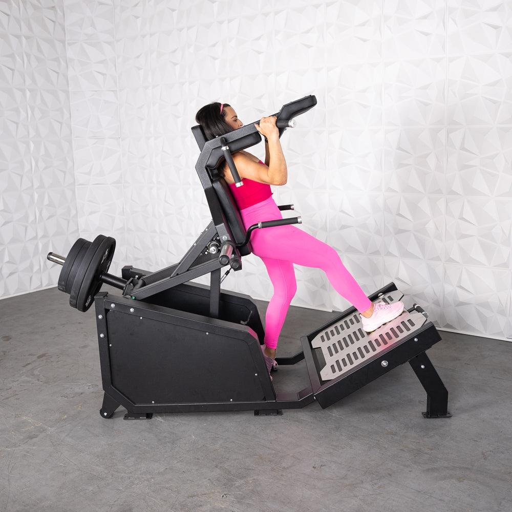 Excel Glute Line Hack Squat / Front Squat - Muscle D Fitness - Plate Load Squat Machine - Counter Balanced - Plate Storage Pegs - Grit Grind Strength