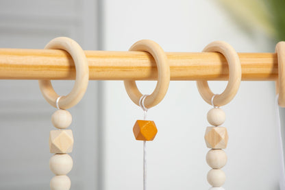 Lilac Wooden Baby Gym | Montessori Infant Play Gym with Hanging Toys - Grit Grind Strength