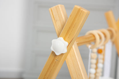 Lilac Wooden Baby Gym | Montessori Infant Play Gym with Hanging Toys - Grit Grind Strength