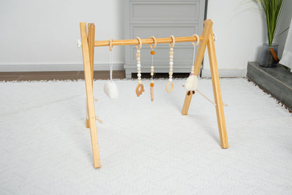 Lilac Wooden Baby Gym | Montessori Infant Play Gym with Hanging Toys - Grit Grind Strength