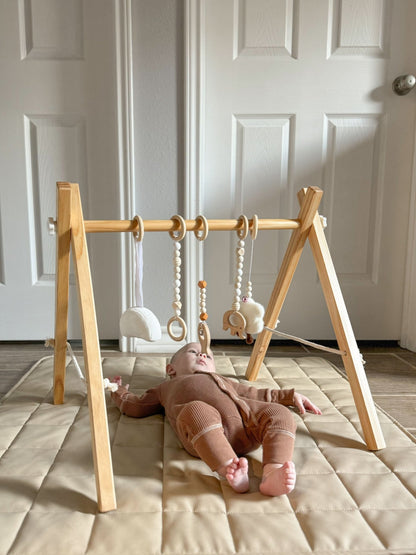 Lilac Wooden Baby Gym | Montessori Infant Play Gym with Hanging Toys - Grit Grind Strength