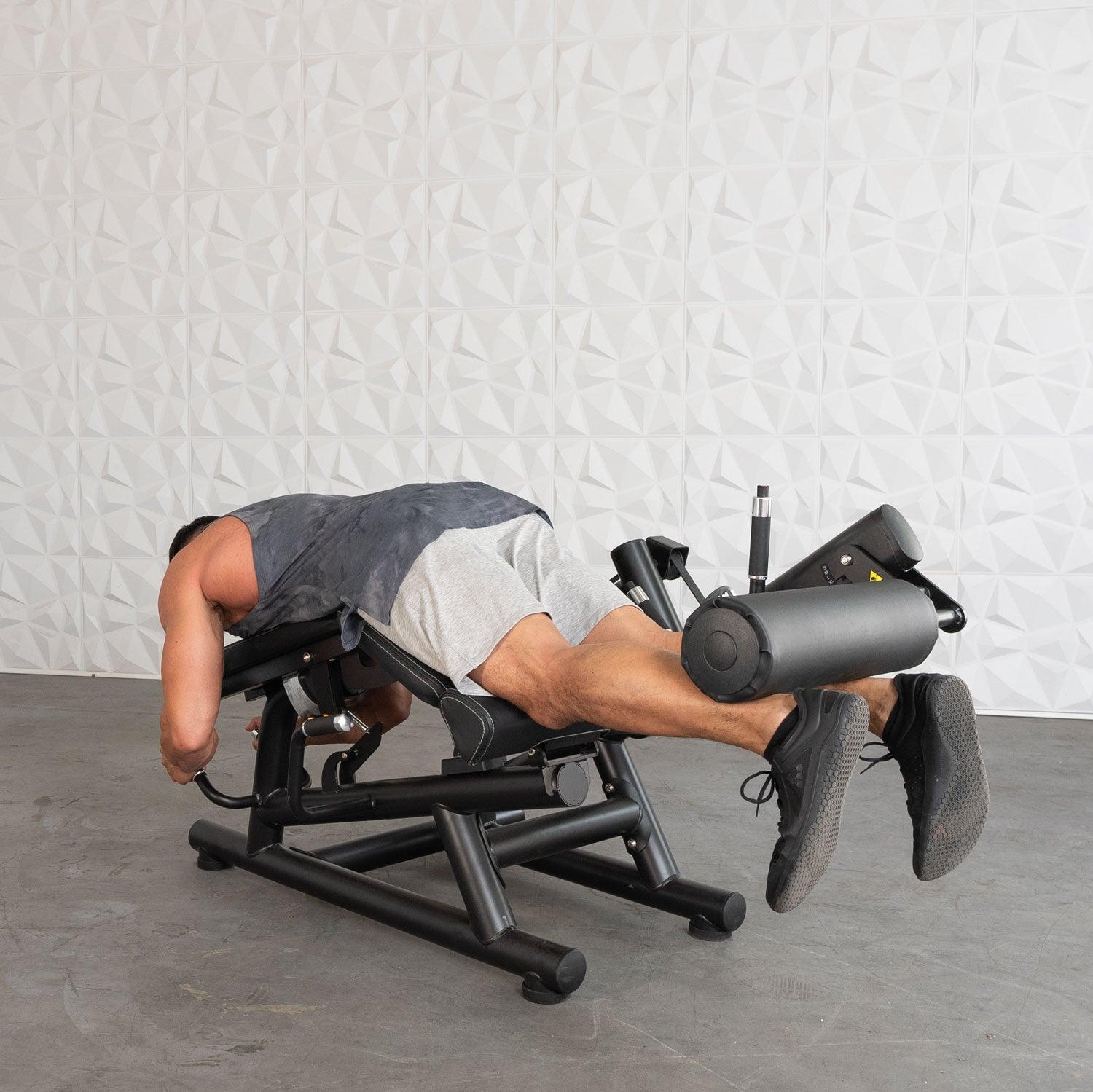 Pro Strength Leg Extension / Prone Leg Curl Combo - Muscle D Fitness - Plate Loaded Quad & Hamstring Machine - Grit Grind Strength