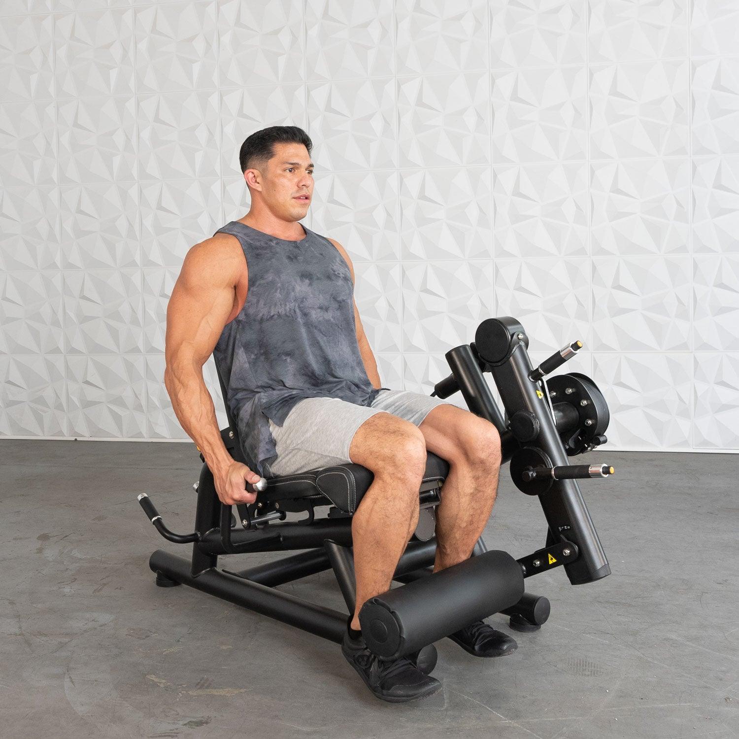 Pro Strength Leg Extension / Prone Leg Curl Combo - Muscle D Fitness - Plate Loaded Quad & Hamstring Machine - Grit Grind Strength